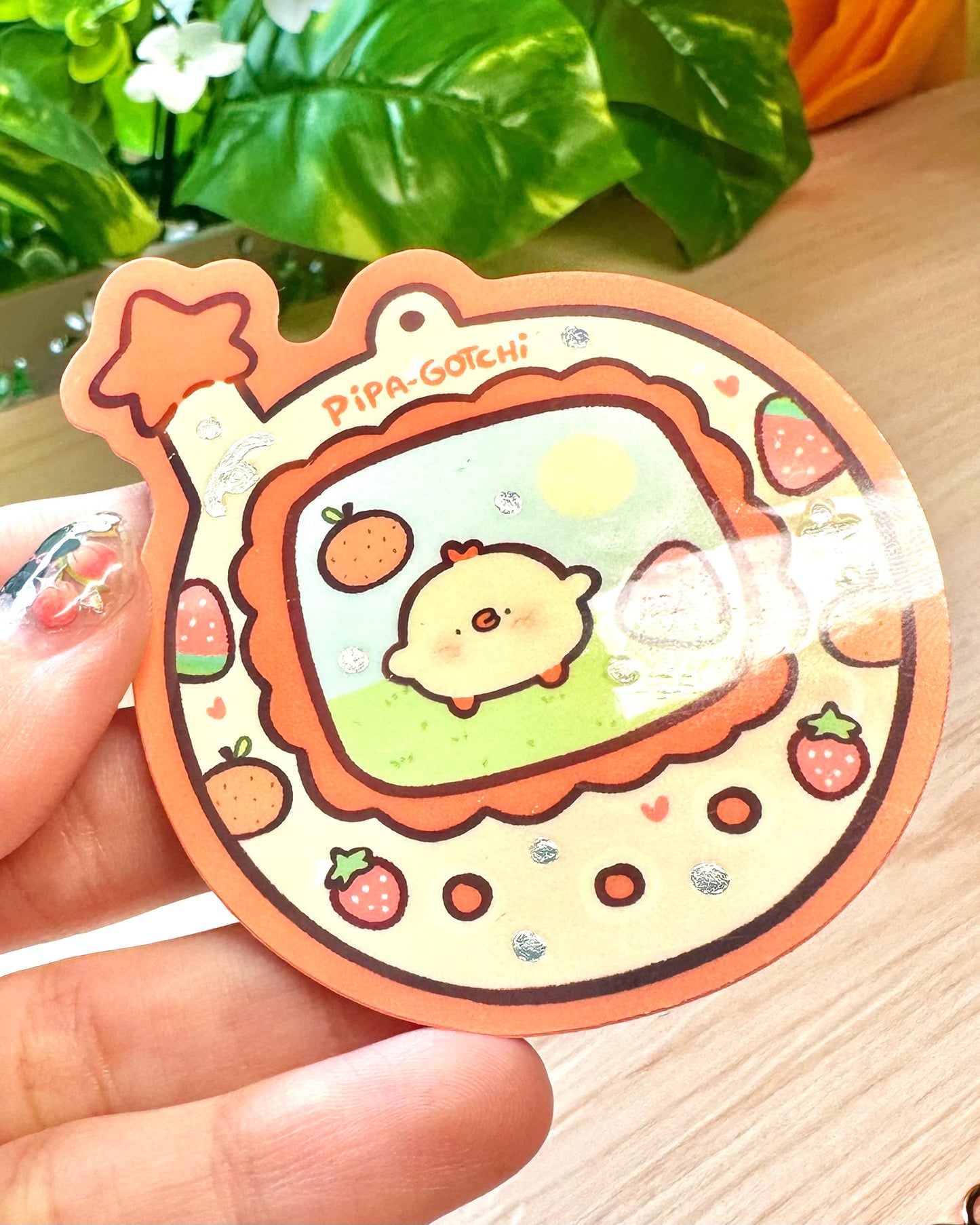 Tamagotchi Pipa with clumsy foil details - Glossy Vinyl Sticker